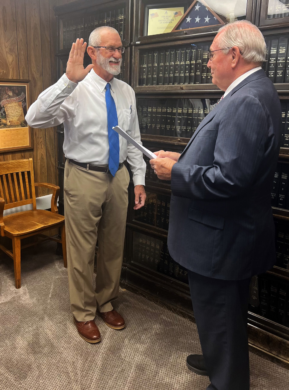 Garza County Judge Lee Norman recently administered the oath of qualification to County Judge-elect Ted Weems, who is unopposed on the November ballot, certifying that Weems meets the legal qualifications to serve as county judge. | COURTESY PHOTO