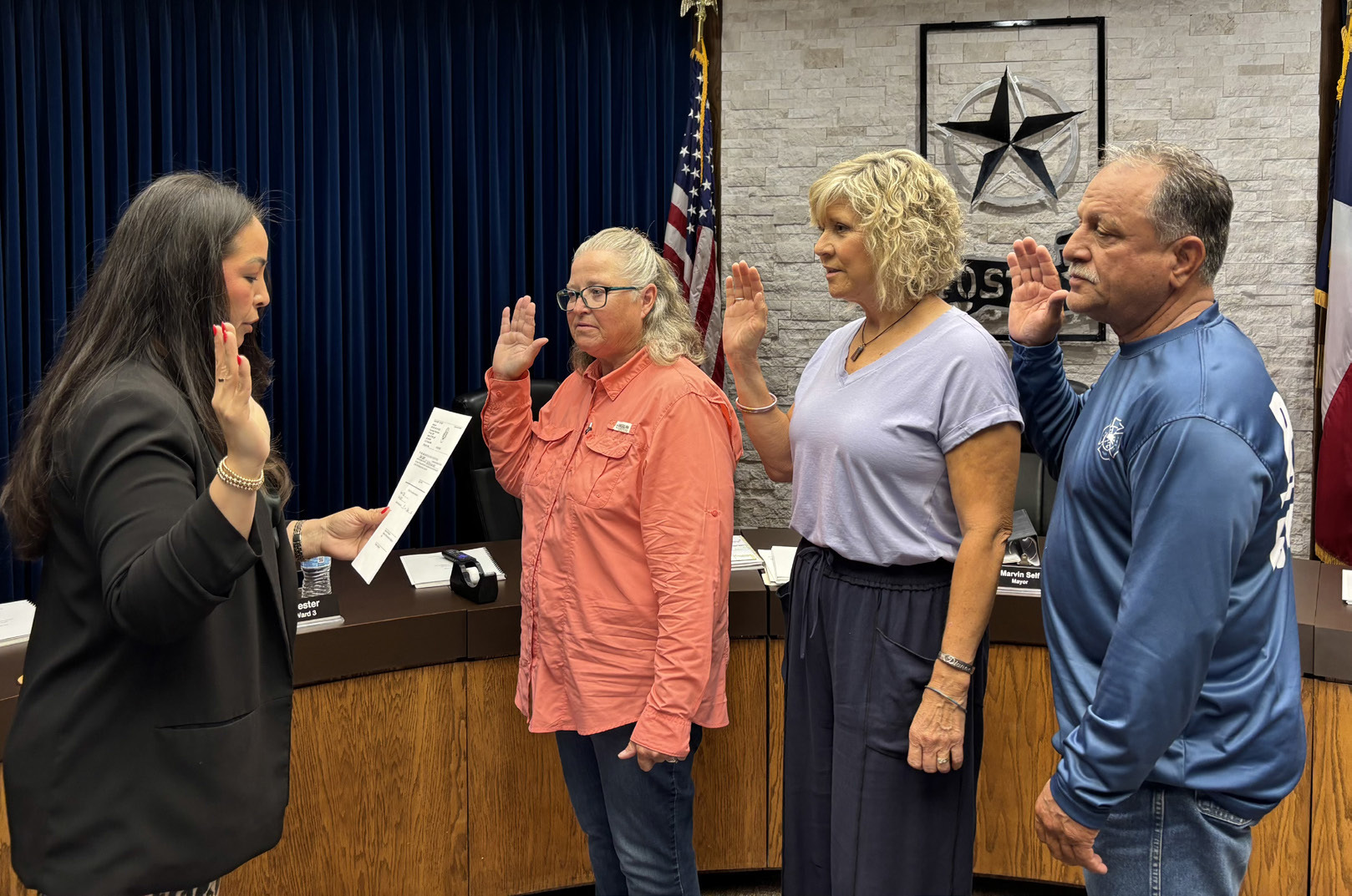 CITY LEADERS Post City Secretary Suzan Collazo (left) administered the oath of office last week to council members Carol Hester, Ward 3; Dianne James, Ward 4; and Jimmy Valdez, Ward 5, during a swearing-in ceremony on June 1 in Post. | COURTESY PHOTO