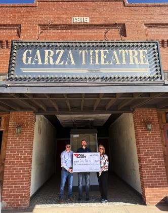 SUPPORTING ITS SECOND CENTURY The Garza Theatre, purchased by Jesse Dixon and Perky Palette two years ago after sitting vacant for a decade, is on its way to a fresh lease on life thanks to seed gifts such as Poka Lambro’s donation earlier this month. Poka Lambro CFO Matt Snowden made the presentation to Angela Dixon and Sean Robertson, Perky Palette representatives. | COURTESY PHOTO