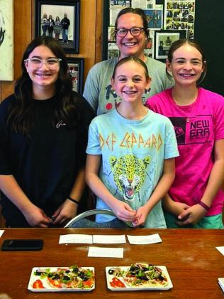 PRACTICE CHALLENGE Garza County 4-H created a mock food challenge contest on Sunday, October 27, with their junior and intermediate teams. Each team raced the clock to make biscuit pizzas and prepare a presentation. Both teams are ready for the district contest on November 5! Junior team: Coach Paul Gibson, Philemon and Samuel Gibson, and EJ Webb. (Samuel Reiter filled in for EJ Webb on Sunday.) Intermediate team: Coach Hannah Gomez, Elliot Talerico, Cenci Torres, and Daveigh Gomez. | XANE REITER PHOTOS