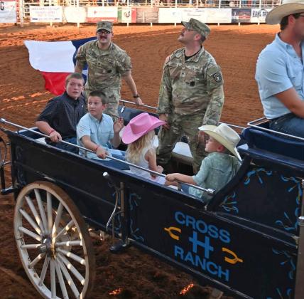 PATRIOTIC SALUTE Members of the U.S. Army were recognized during opening ceremonies at the 86th annual Post Stampede Rodeo. | AMY MASON PENNELL