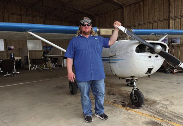 FLIGHT GRADUATE Rowdy T. Wilkinson from Snyder, TX is pictured with the CE-150 airplane. Wilkinson is the second graduate from U.S. Flight Academy in Post, TX by instructor Jarle Boe of Post, TX. On July 23, Wilkinson received his certificate and rate of FAA (Federal Aviation Administration) Private Pilot ASEL (Aircraft Single-Engine Land). ASEL license is a class pilot license that allows the holder to operate single-engine airplanes that take off and land on land. | COURTESY PHOTO