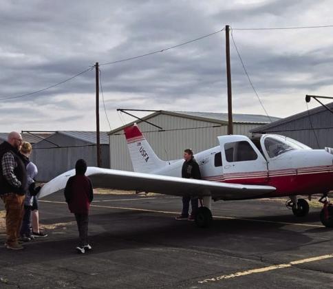 LITTLE AIRPLANE Jarle Bø pulled his private airplane from the hangar to host the Post Rotary Club during their spring social, Thursday, April 3. | COURTESY PHOTO