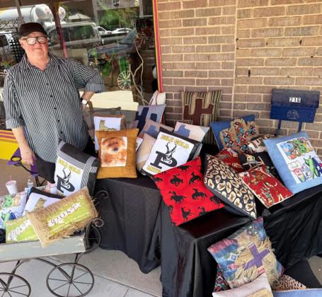 CUSTOM CREATIONS Sonny Ammons with Weeping Willows Design, displayed and sold custom-made decorative pillows during Stampede Saturday. | STEPHANIE ALLEN