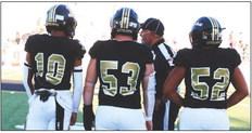 FIRSTWIN Post Bold Gold Antelopes 2023 team captains Jamarion Reed (10), Mason Wright (53) and Alejandro Rodriquez (52) received last minute instructions from a referee before taking the field during Friday night’s game. Post got its first win of the season, defeating Slaton 32-6 before a Homecoming crowd. | WHITNEY DORSETT PHOTO