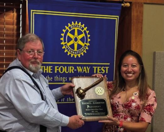 NEW ROTARY PRESIDENT New Post Rotary President Lynn Simpson honors Past President Dr. Xochitl Anderton at their induction dinner on June 27 in the Post Heritage House. During this past year President Xochitl guided her club in achieving three Foundation Awards, the PolioPlus Award, and the RI Club Citation Award. | COURTESY PHOTO