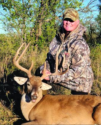STRAIGHT 8 WINNER Alisa Key of Fort Worth was the winner of the Straight 8 category of the Star Feed Big Buck Contest this year. Alisa’s 8-point had an inside spread of 20 inches and a total score of 146.5. The deer was shot in Kent County, in early November, with a rifle. Alisa won $1,000 and a monogrammed jacket. | COURTESY PHOTO