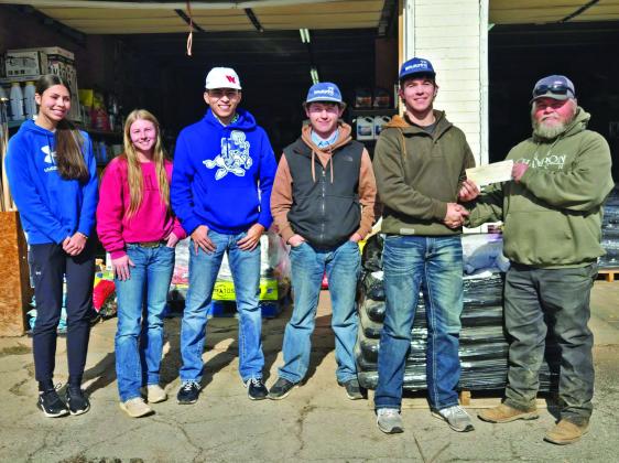 BUCK WINNER DONATION After Evan Botsford of Lubbock was named the Overall and Bow Winner of the 2024-25 Big Buck contest, he donated is $1,000 cash prize to the Spur FFA Booster Club. | COURTESY PHOTO