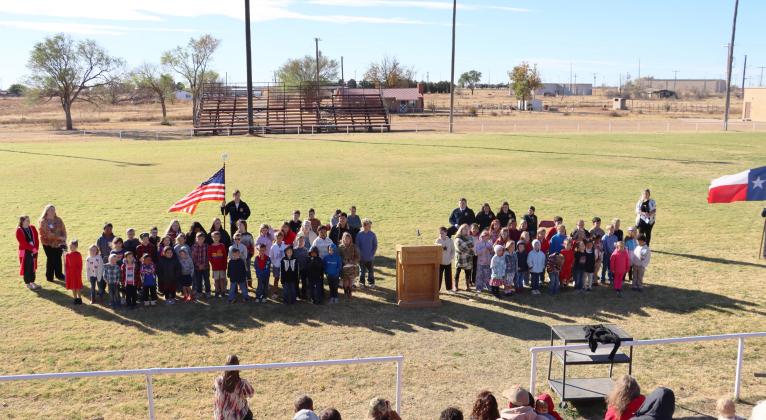 LAST NOVEMBER Southland ISD elementary students and teachers gathered on the rural school’s football field for the annual Veterans Day program, honoring local service members. | COURTESY PHOTO