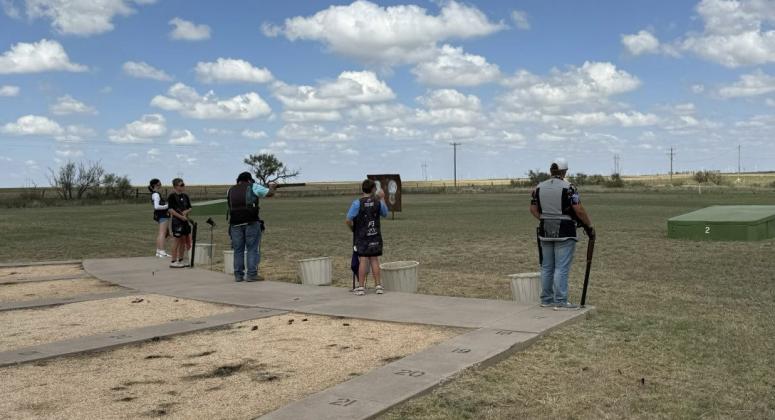 Squad watching as Bryan Saucedo shoots doubles.