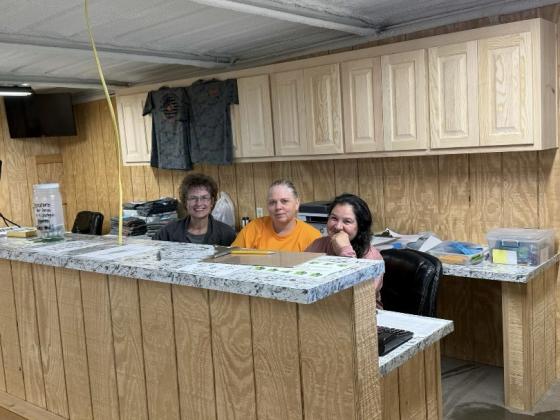 Marci Oden, Lichelle Hudman and Angelia Johnson are behind the scenes making the event possible.