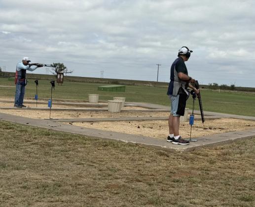 Two of our annual shooters shooting handicap.