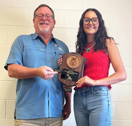 Texas Farm Bureau Insurance recently named Reese Huffaker of Post FFA Ag Student of the Month; agent Ron Francis presented the award. | COURTESY PHOTO