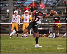 Zach Grubbs #13 hauls in a one-handed catch resulting in one of the touchdowns the Eagles scored in their 81-36 win over Lubbock Christ the King. | RON FRANCIS PHOTO