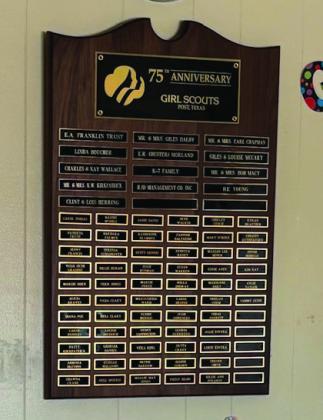 HONORARY PLAQUE A plaque was hung at the Scout House to honor the many supporters and former troop leaders. “Many thanks to all who have been a part of Post Girl Scouts for the past 75 years—we couldn’t have done it without you,” says Carol Tobias, Girl Scouts board member. | CAROL TOBIAS PHOTO