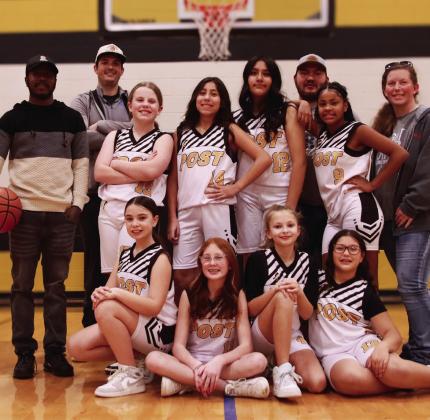 Girls 5th/6th Coaches Sheldon Gray, Carson Windham, Sponsor WinCo, and players Desirae Bell, Halle Guthrie, Macie Hiracheta, Gabriela Hernandez, Annabella Graves, Kinley Gomez, Riley Riedel, and Charlotte (Charley) Windham. | WHITNEY DORSETT PHOTO