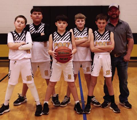 Boys 5th/6th Coach Bradley Whisenhunt, Sponsor Suber ESP Solutions, and players Xzavious Luna-Ward, Eli Perez, Paxton Matus, Charlie Cotton, Aaron Brooks, Bryson Bloomingdale, and Jaiden. | WHITNEY DORSETT PHOTO