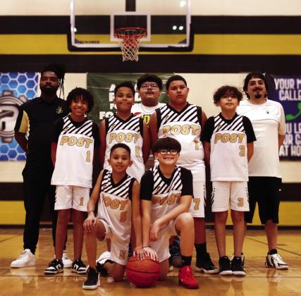 Boys 5th/6th Coach Jacob Rodriguez, Sponsor Sonic Drive In of Post, and players Tyson Jefferson, Elijah (EJ) Webb, Max Rojas, Aidan Castro, Ruben Moreno, Leslie White, and Mosiah Brown. | WHITNEY DORSETT PHOTO