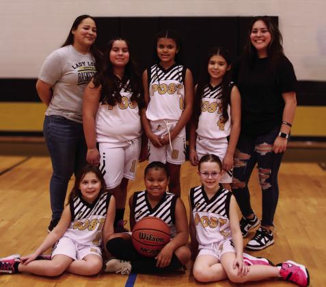 Girls 3rd/4th Coaches Aracely Soto &amp;amp; Keila Rodriguez, Sponsor Thompson Wrecker Service, and players Kahla Coghill, Eva Jo Grizzell, Linkyn Jeffrey, Adela Contreras, Dezariyah Spann, Brooklyn Collins, and Jaelynn Soto. | WHITNEY DORSETT PHOTO