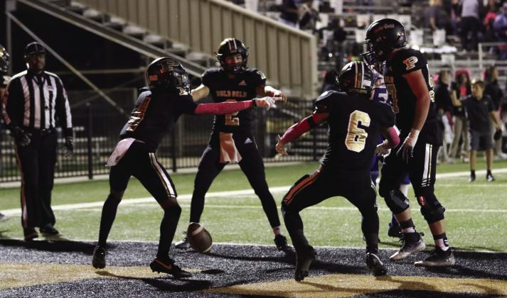 Antelopes celebrate in the end zone. | ABIGAIL RODRIGUEZ PHOTOS