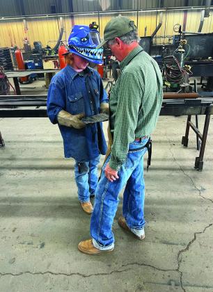 WELDING CLASS Post ISD captured a photo of students earning college credit while learning the trade of welding on Wednesday, October 23. This class is taught by ag mechanic and welding contest coach Perry Smith. | COURTESY PHOTO