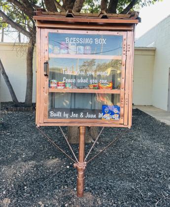 COMMUNITY RESOURCE The new Blessing Box, provided by Ricky and Joanna Walters, is located in front of the Post Rotary Club building and offers food and other necessities to those in need. | COURTESY PHOTO