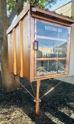 NEIGHBORS HELPING Community members are encouraged to support the Blessing Box by taking what they need and leaving donated food and necessities when they are able. | COURTESY PHOTO