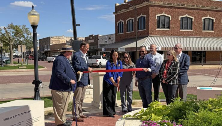 RIBBON CUTTING Post Rotary Club members and community leaders participated in a ribbon-cutting ceremony Monday, Oct. 5, to celebrate the dedication of the club’s Centennial Clock in downtown Post. | STEPHANIE ALLEN