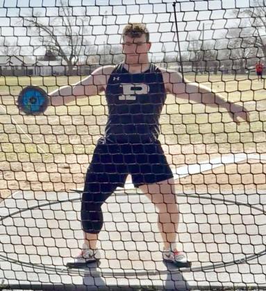 FIRST PLACE Mason Wright throws the discus at the Coahoma Invitational, earning a first-place finish. | COURTESY PHOTO