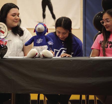 LCU Abigail Rodriguez signed her letter of intent with Lubbock Christian University where she will pursue a Bachelor of Science degree in Nursing. Looking on as she signs are Zoey Pequeno and Madeline Soria. | COURTESY PHOTO