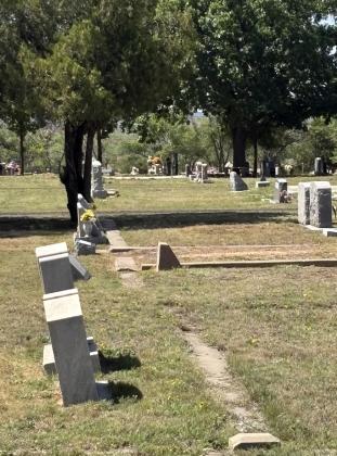MONUMENT MOVEMENT Headstones stand at varying angles in the Post Cemetery, where natural ground movement and weathering have caused some grave markers to shift. | COURTESY PHOTO