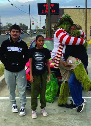 THE GRINCH The WTX Grinch came to Post Monday, December 2. He stopped at McDonald’s from 4 p.m. - 5 p.m. for free pictures. A few locals made their way and took some photos. You may find more photos on page 6 | PHOTOS PROVIDED