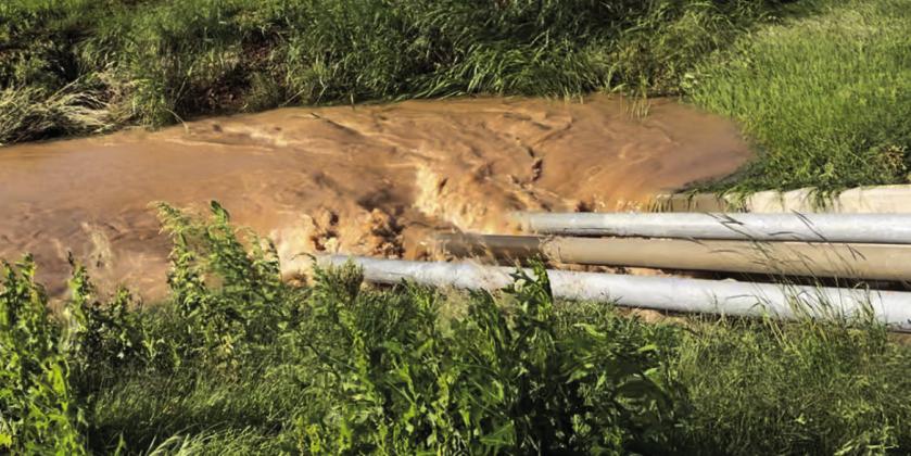 Rolling Water after Thursday afternoon rains began flowing out of fields on West 380 near the caprock draining to the south side of the road and through fields creating a waterfall at the caprock. A flash flood warning was issued by the National Weather Service on June 1 at 2:12 p.m. TxDot closed West 380 Thursday afternoon after the area received almost 5 inches within a three-hour span. Photos by Julia Childs