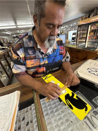 HERE HE IS The Jack Rabbit’s own Tony Jaquez crafted a miniature replica sign for us denoting 634 miles from our own headquarters in Spur, Texas, to here. | TEXAS SPUR
