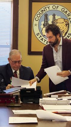 SIGNING TO ISSUE During Commissioners’Court Tuesday, August 27, Judge Lee Norman signed the issuance and sale of certificates of obligation in an amount not to exceed $3,500,000. This will finance the contract with Sydaptic for the Dalby Facility Technology Upgrades. | ANNA GIBSON PHOTO