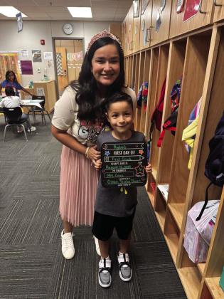 Ayden is with his first-grade teacher, Mrs. Cruz; Ayden wants to be an ocean scuba diver. Good luck in first grade!