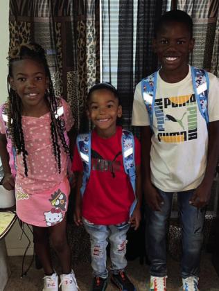 Candice Martin had the kids line up for the first day of school photo. Honestee is a second grader, Traevion is a first grader, and J’kayden is a fourth grader. | COURTESY PHOTO