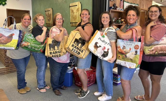 FEED SACK CREATIONS Participants in the Garza County AgriLife Extension adult sewing class created tote bags from repurposed feed sacks. | COURTESY PHOTO