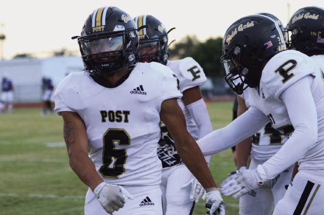 DISTRICT BEGINS Teammates congratulate junior IanVergara on his return to the field and his touchdown to put the Antelopes ahead of the Olton Mustangs 8-0 only three minutes into the first quarter. | ABIGAIL RODRIGUEZ