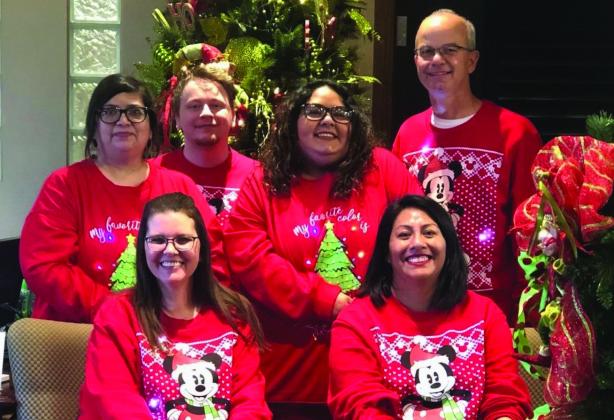 OPEN HOUSE Peoples Bank held their annual Christmas Open House last week. Employees greeted guests throughout the day, including (seated) Stormie Lawrence and Sierra Guerrero. Standing Raquel Britton, Reid Banta, Rubi Ann Rodriquez and Clay Miller. | PHOTO PROVIDED