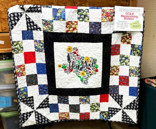 WILDFLOWER QUILT The Garza County Junior Livestock Homemaking Division sewed a quilt in their first year for a raffle. During the Livestock Sale on Thursday, Jan. 16, RaeAnna Dennison won the quilt raffle drawing. | XANE REITER PHOTO