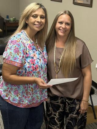 OATH ADMINISTERED Brandy Fannon, right, administered the oath of office to new Garza County Health Care District board member Janie Suber during the board’s June 25 meeting. | COURTESY PHOTO