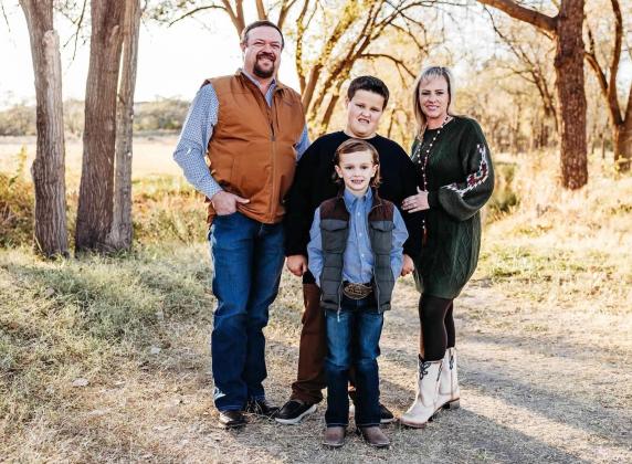 ALL ABOUT FAMILY Ross and Kim Aten with their two sons, Jase and Ryder. | COURTESY IMAGES
