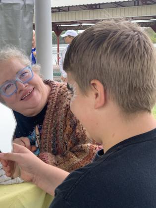 FACE PAINTING Gianna Martin-age 4, was the first to have her face painted at the Post Methodist Church Praise in the Park event Saturday. | PAULA JACKSON PHOTOS
