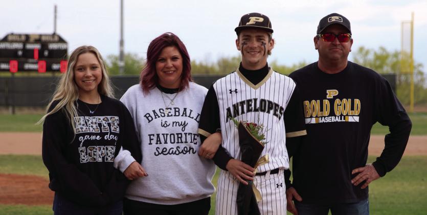 Jacob McClellan escorted by: Samantha, Michael and Harli McClellan