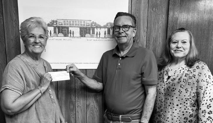 PROJECT SUPPORT Nancy Thuett awarded a donation to the Garza County Pavilion Project as pavilion committee members Jay Young and Carol Williams received the contribution. | COURTESY PHOTO