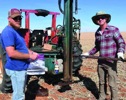 Joseph Burke, Ph.D., right, Texas A&amp;amp;M AgriLife cropping system agronomy and weed scientist at Lubbock, works with Ira Yates, left, collecting soil samples at the on-farm research site near Lamesa. Texas A&amp;amp;M AgriLife photo by Katie Lewis