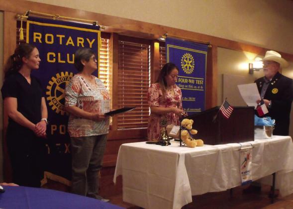 PAUL HARRIS AWARD Meagan Gottlich (Rotarian) and Virginia Bevers receive the Paul Harris Fellowship award from President Xochitl Anderton and Governor Geron Scates for their community work as Physical Therapists and serving the Post area. | COURTESY PHOTO