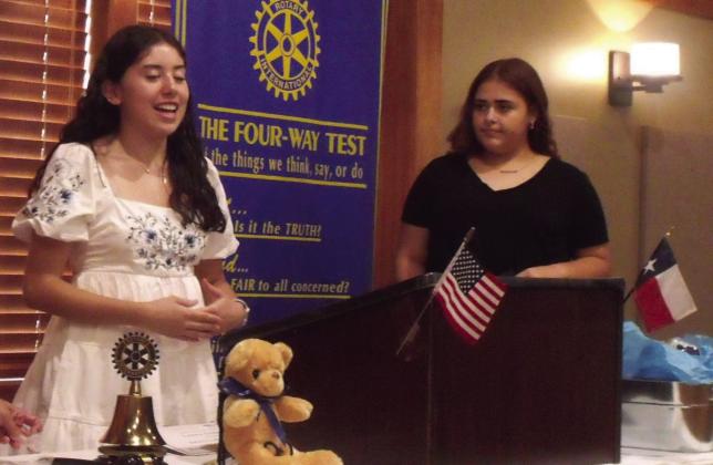ROTARY CAMPERS Rotary Youth Leadership Awakening campers Laura Anderton and Adalina Resendez share their experience from camp on the South Plains College Campus earlier in June. Anderton received a first-place award in the speaking contest. | COURTESY PHOTO