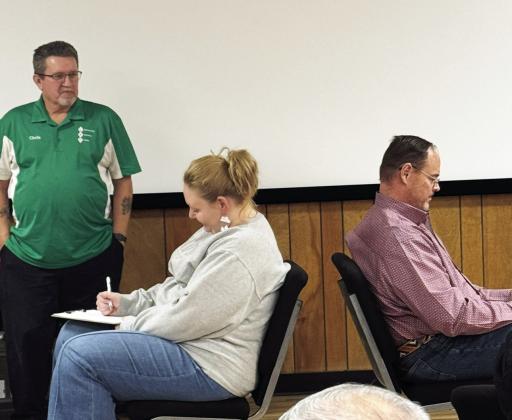 POST ROTARY CLUB Chris Atkinson (left), Director of the Community Recovery Center (CRC), guided Anna Gibson and Rhett Parker through a demonstration that highlighted the challenges and significance of communicating effectively with individuals struggling with addiction during his presentation to the Post Rotary Club members at their regular meeting on Tuesday, Feb. 10, in the CRC building. | COURTESY PHOTO